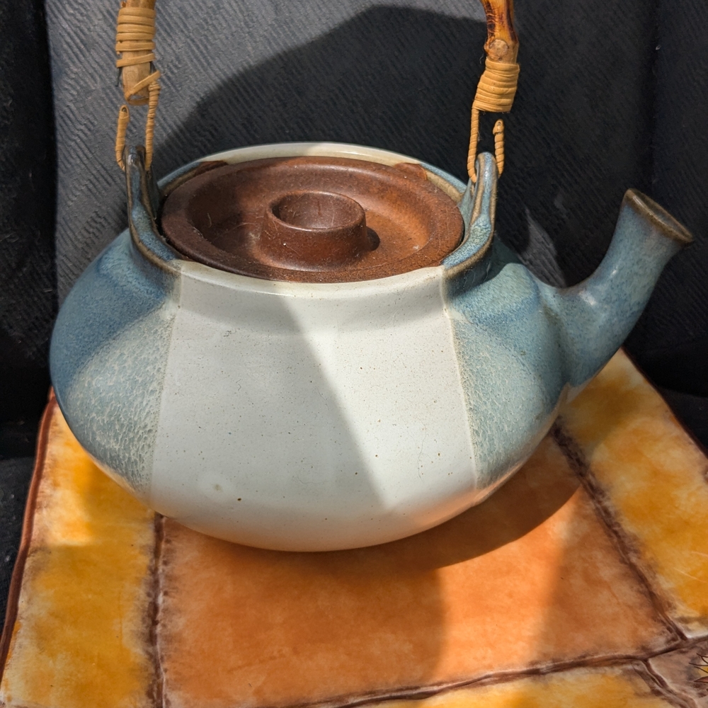 Elegant Blue and Brown Ceramic Teapot